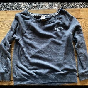 Adorable sweatshirt with cut out back.